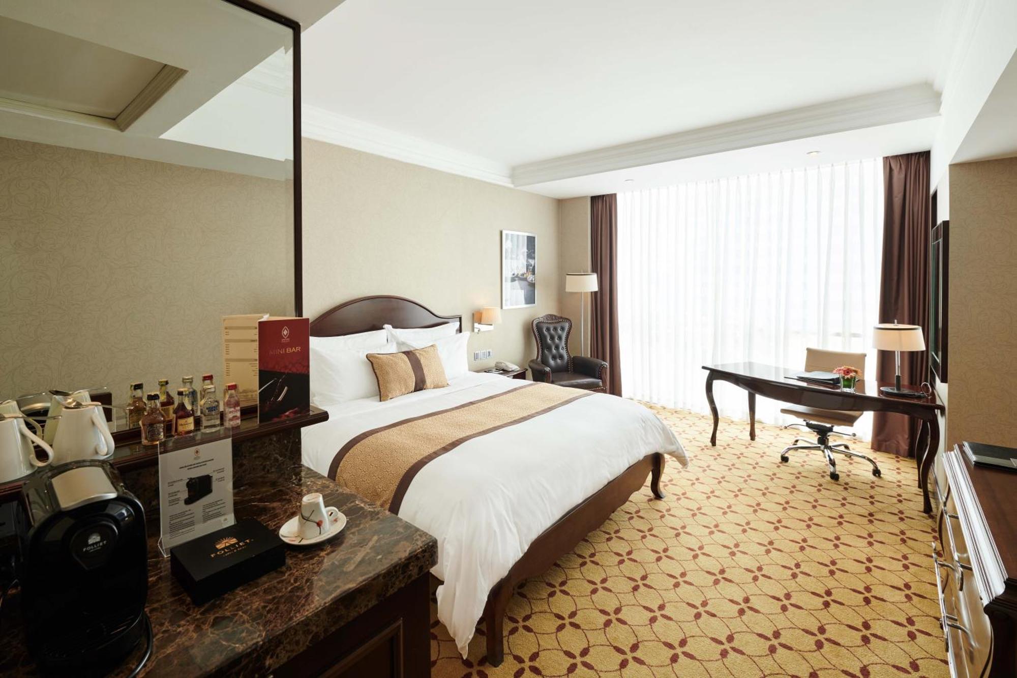 Eastin Grand Hotel Saigon Cidade de Ho Chi Minh Exterior foto Deluxe Room